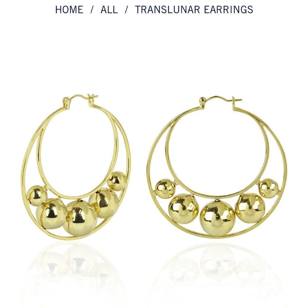 Stunning Translunar hoop
Earrings new without tags nOIr jewelry